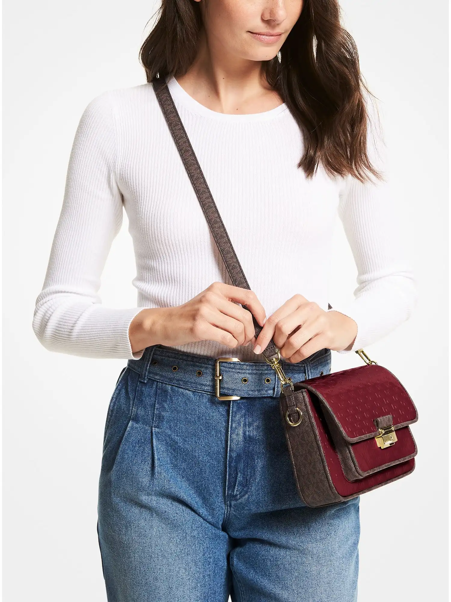 bradshaw medium logo embossed patent leather messenger bag dk berry