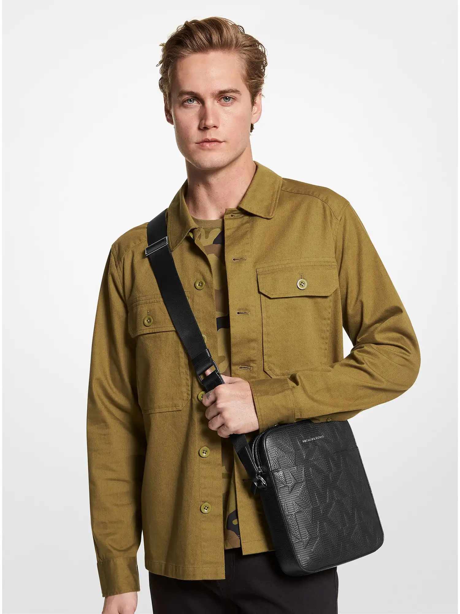 cooper logo embossed leather flight bag black