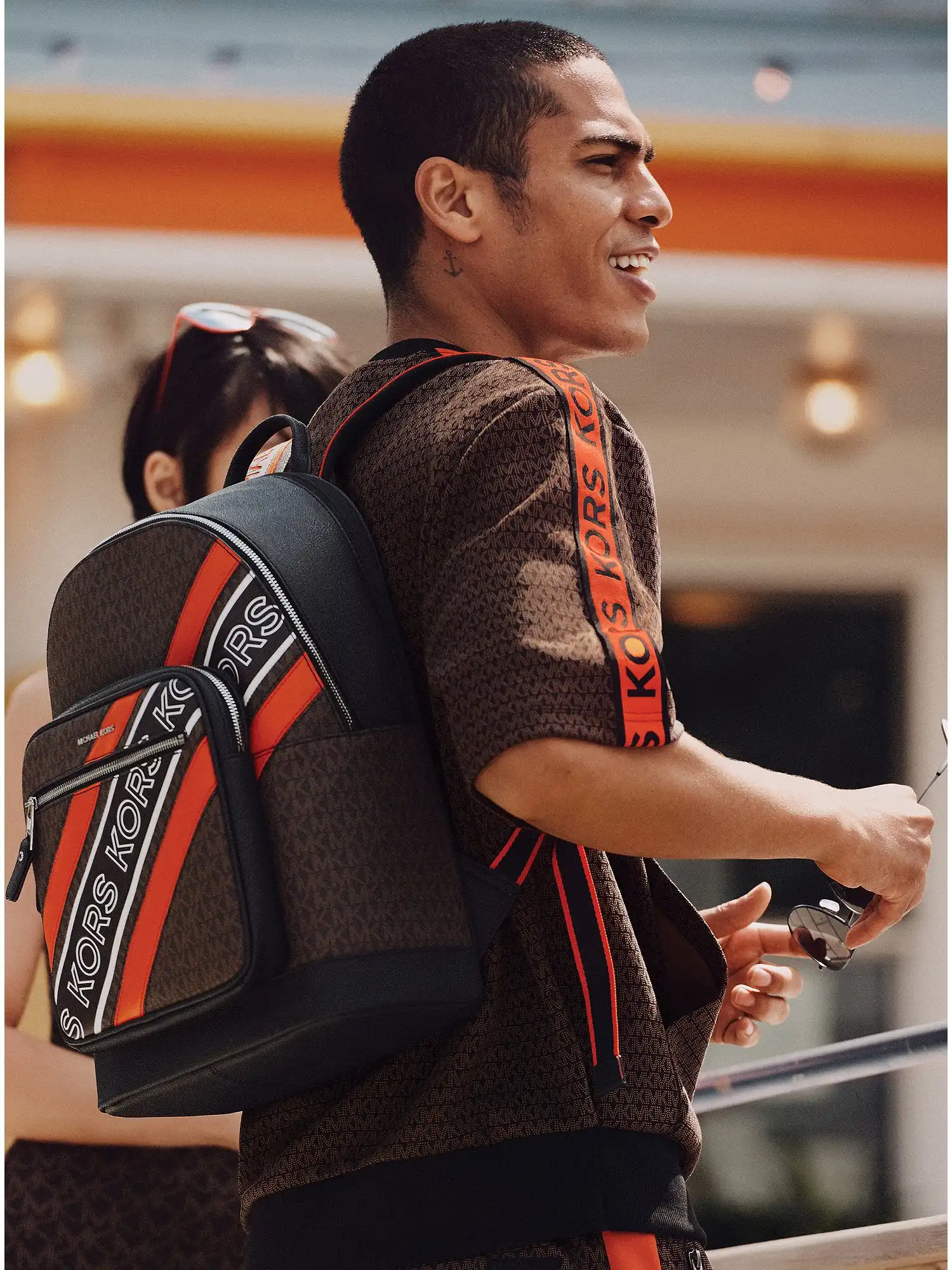 hudson logo embossed stripe backpack brown opt orange