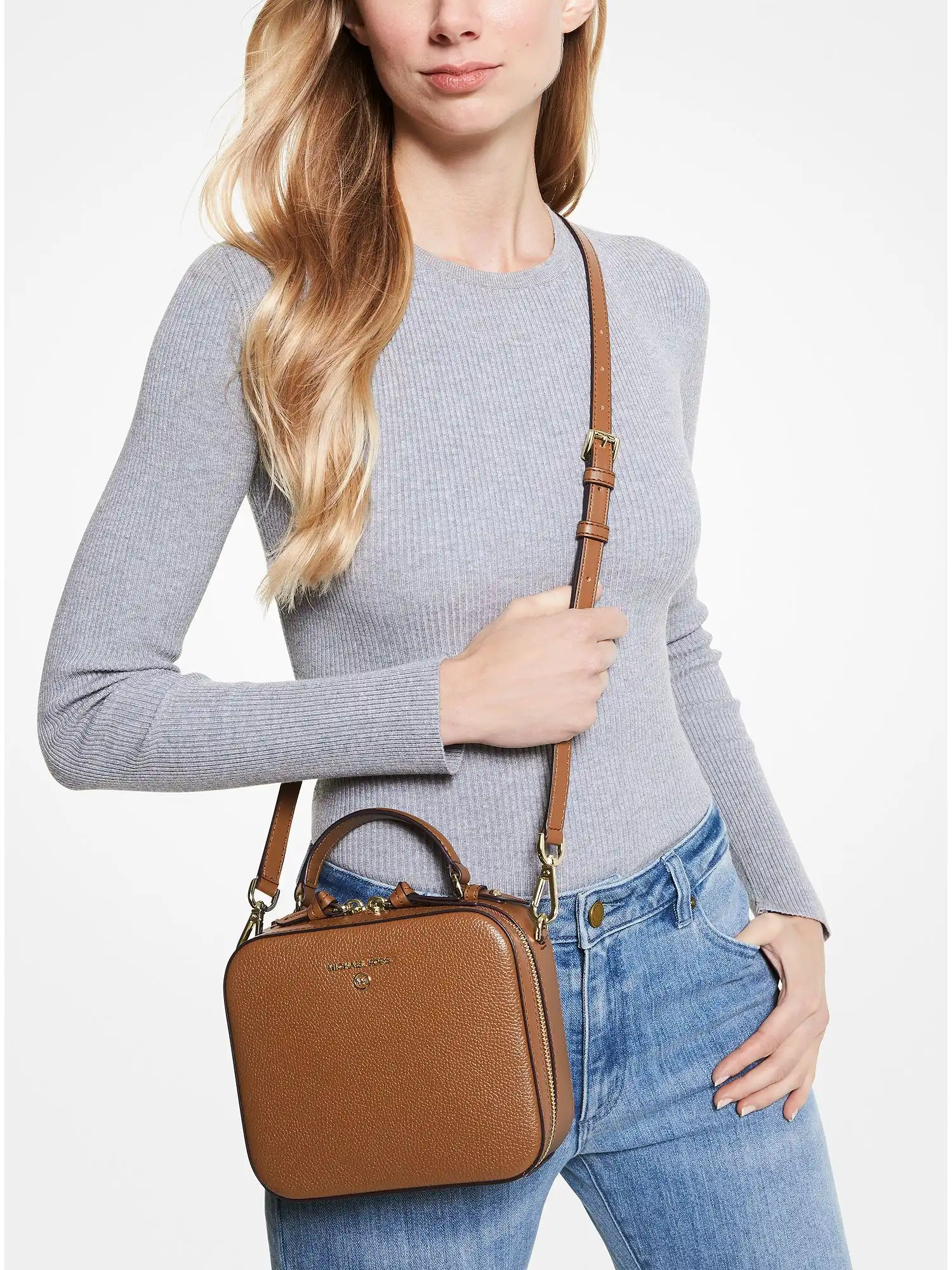 jet set medium pebbled leather crossbody bag luggage