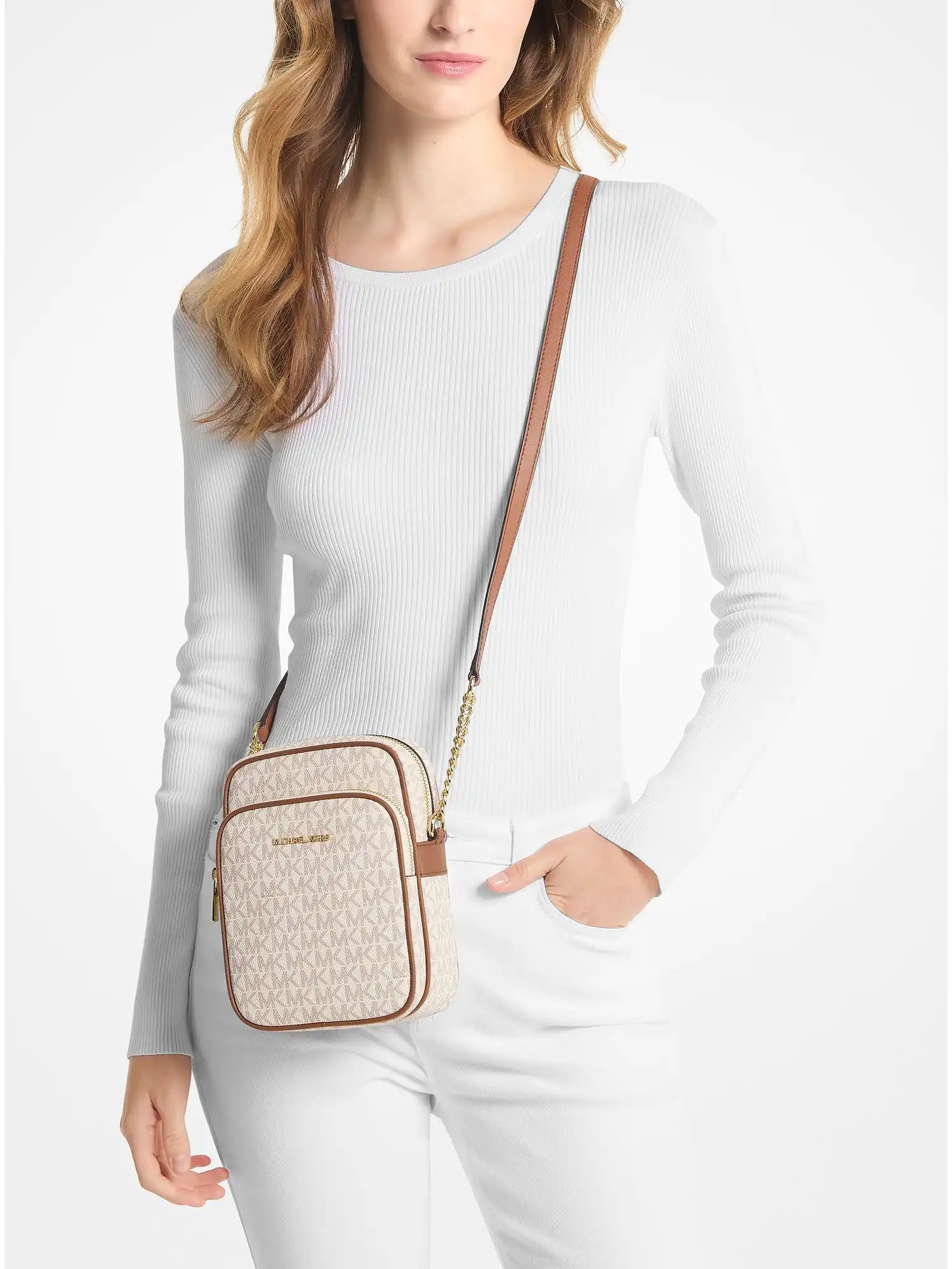 jet set travel medium logo crossbody bag vanilla