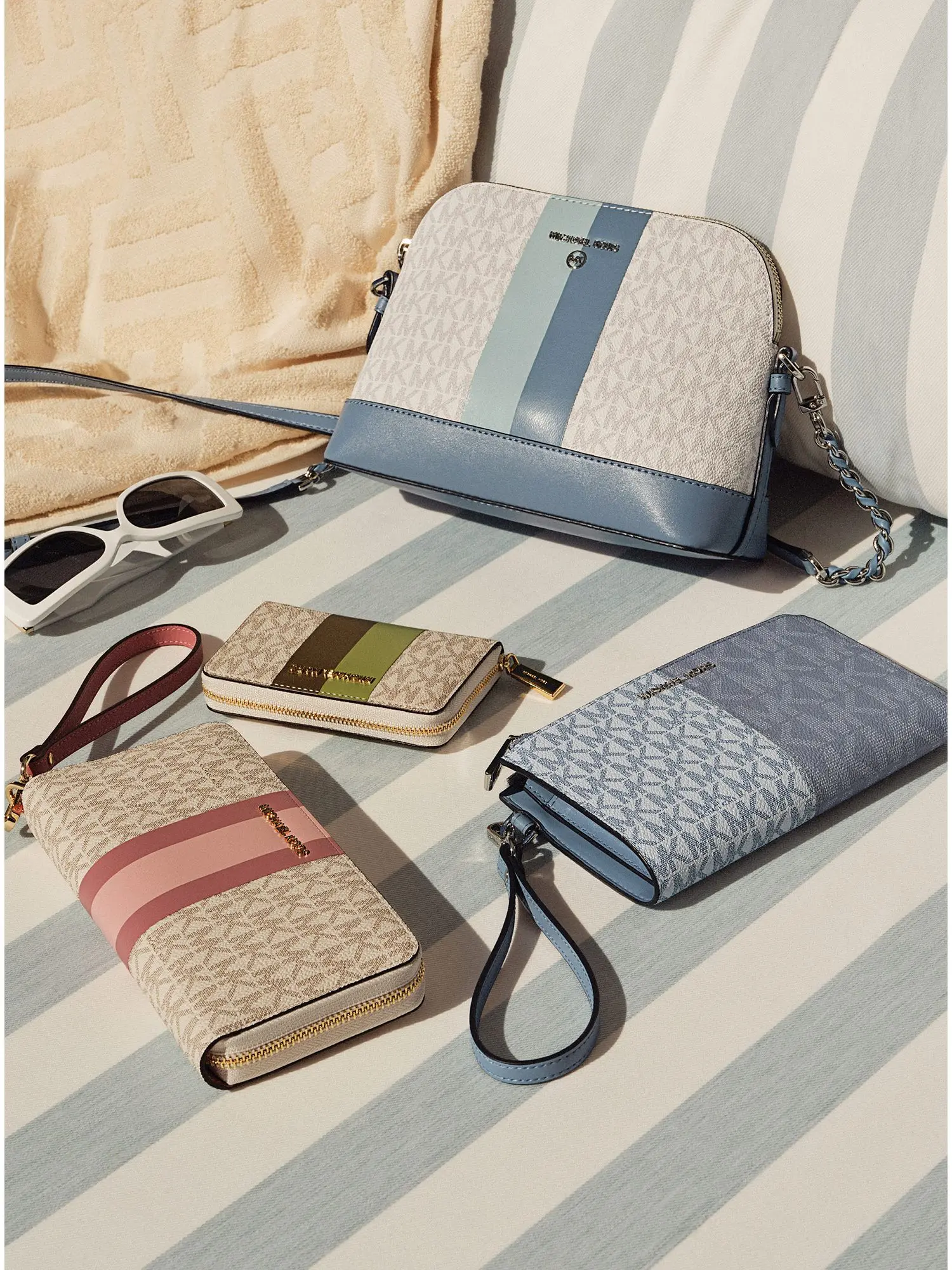 logo stripe continental wristlet rose multi