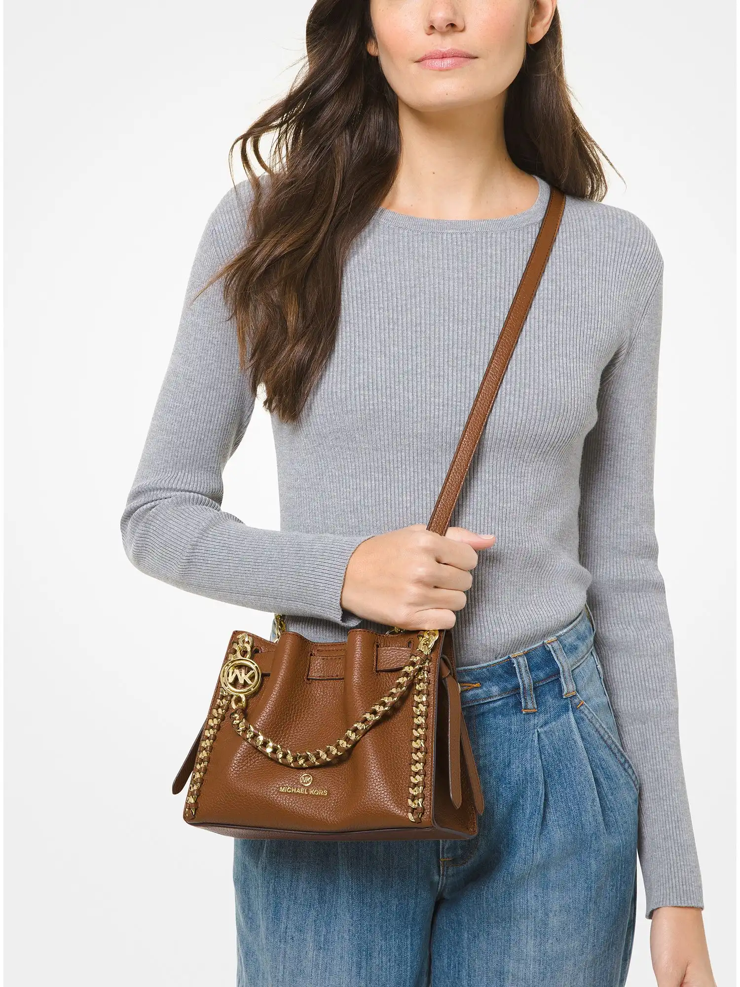mina small pebbled leather crossbody bag luggage