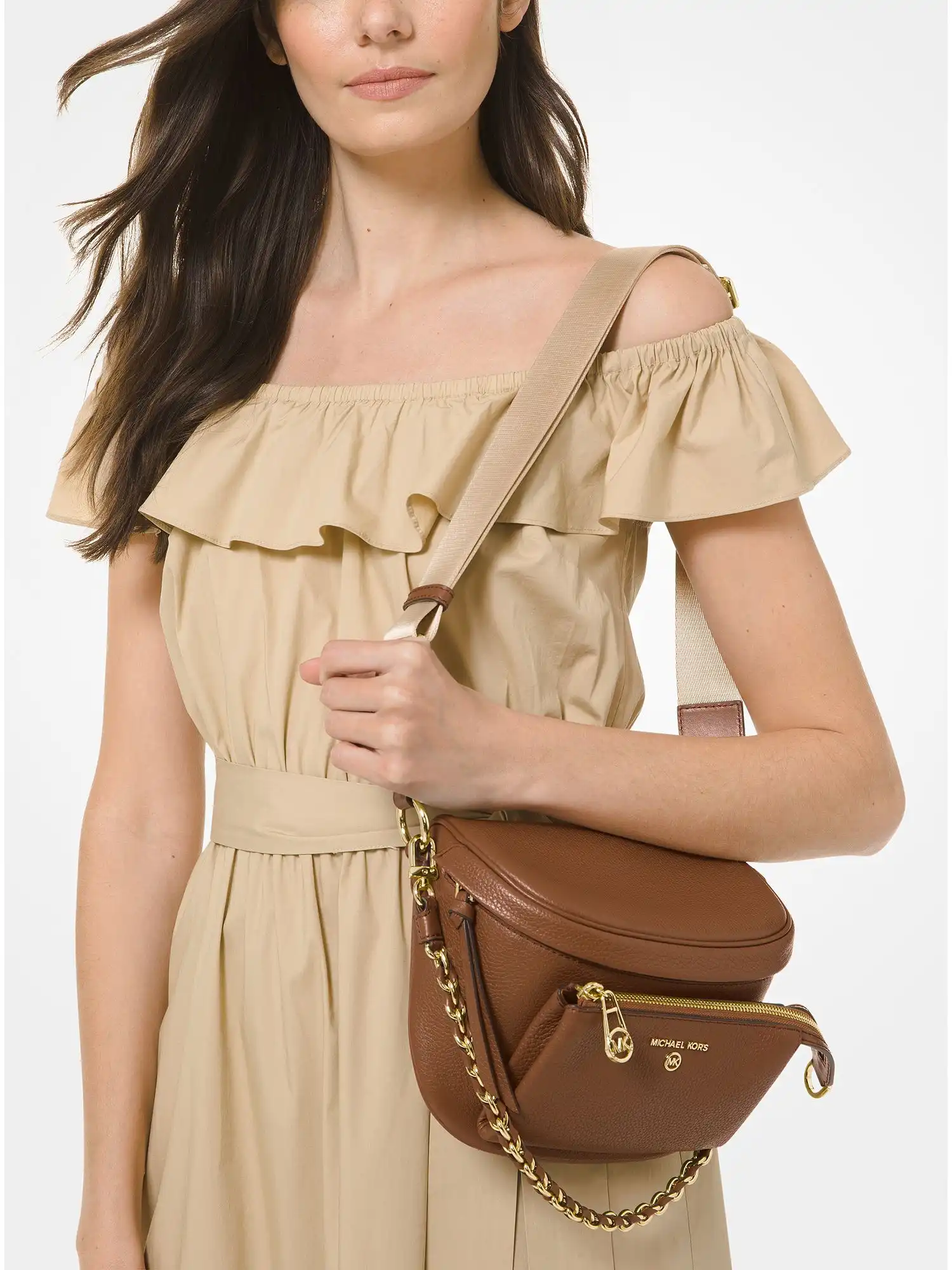 slater medium pebbled leather sling pack luggage