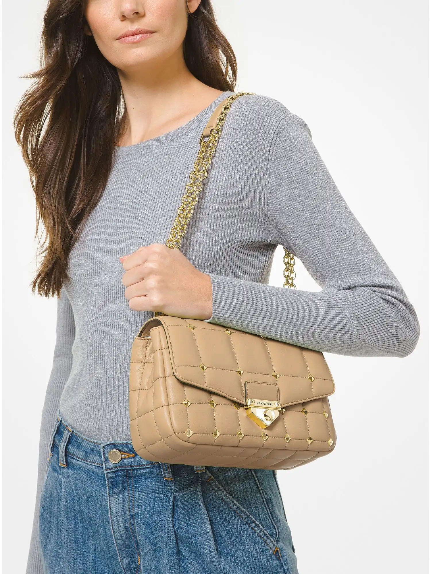 soho large studded quilted leather shoulder bag camel