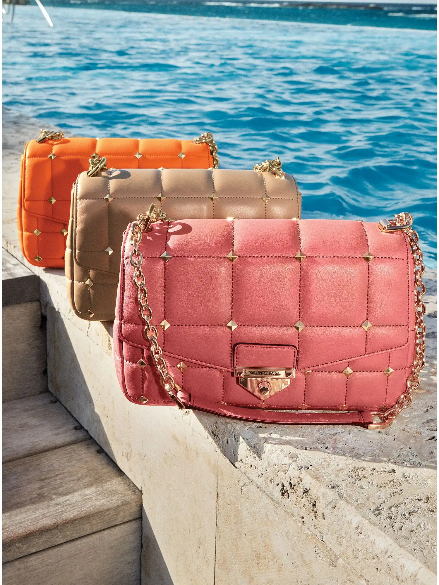 soho large studded quilted leather shoulder bag camel